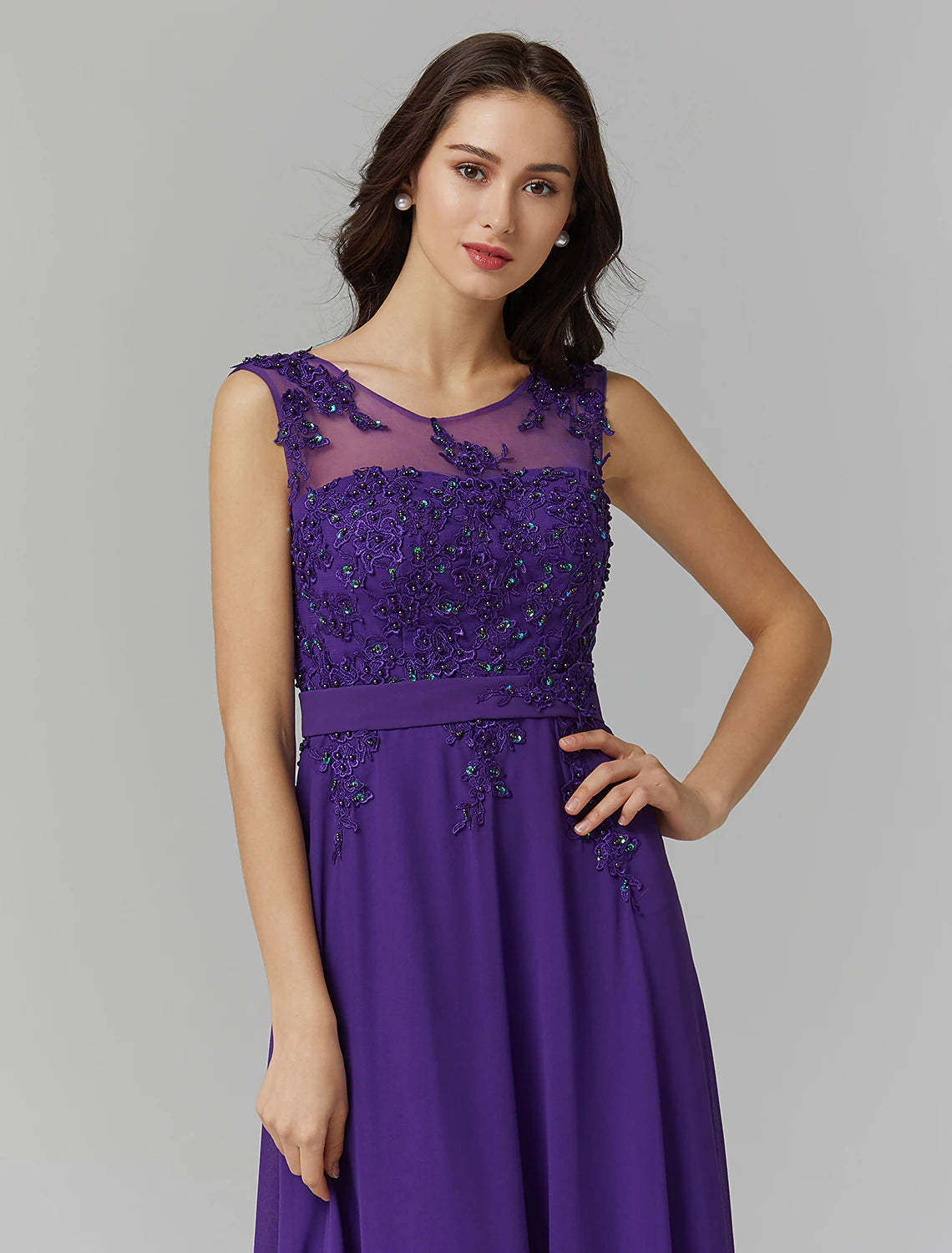 Close-up of illusion neckline with intricate beading on Chinese style dress.