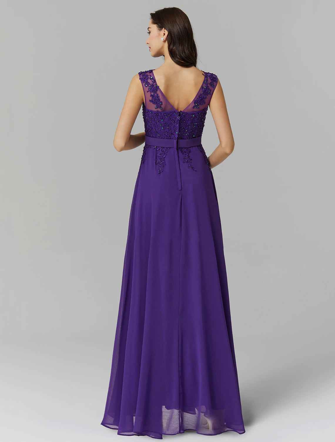 Side profile of floor-length A-Line prom dress.