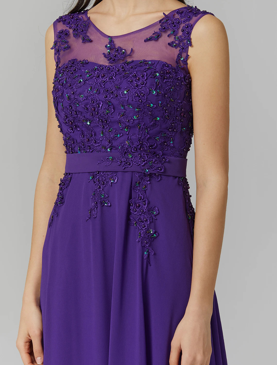 Detail of the flowing chiffon skirt of the A-Line dress.