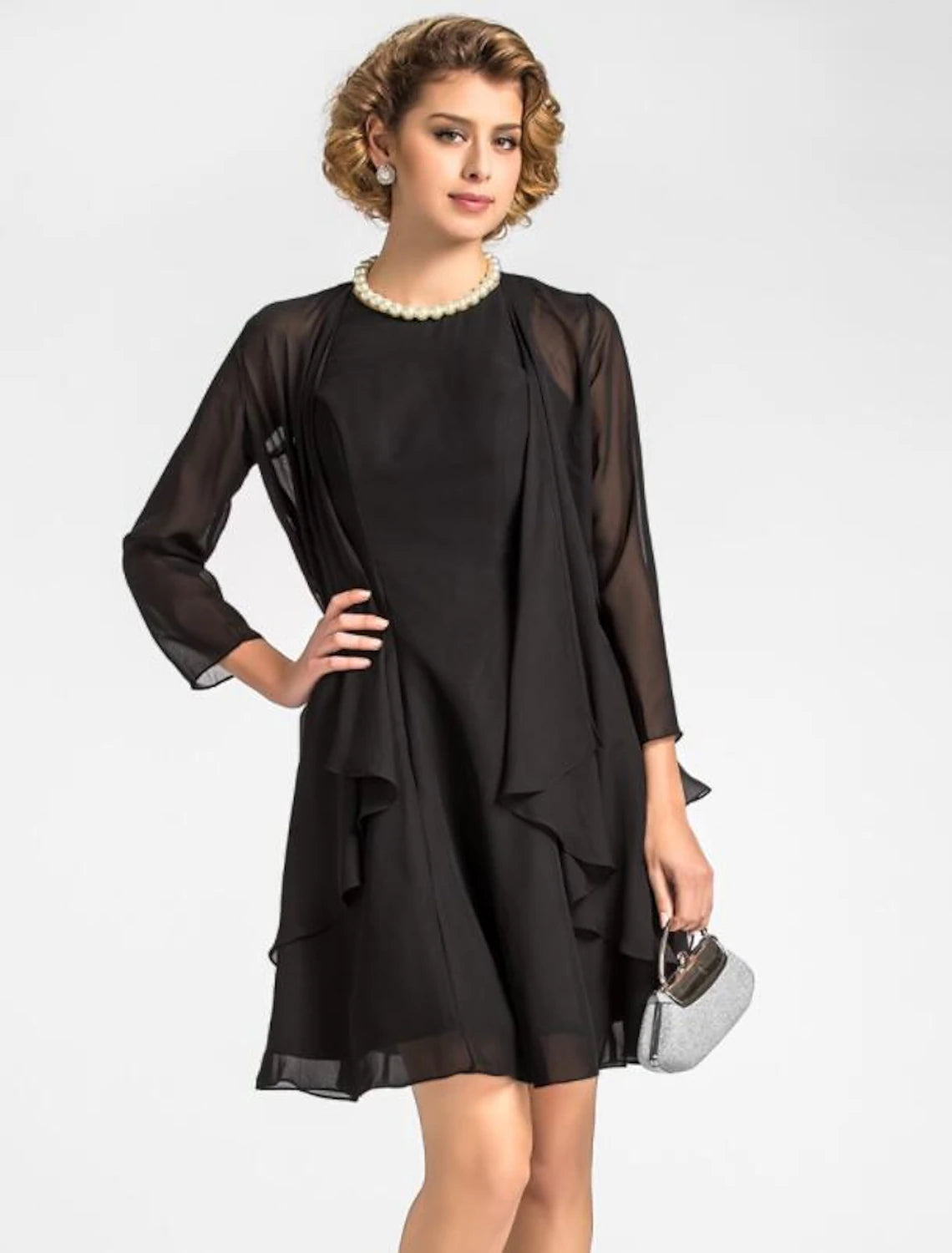 Side profile of the knee-length Mother of the Bride dress with included wrap.