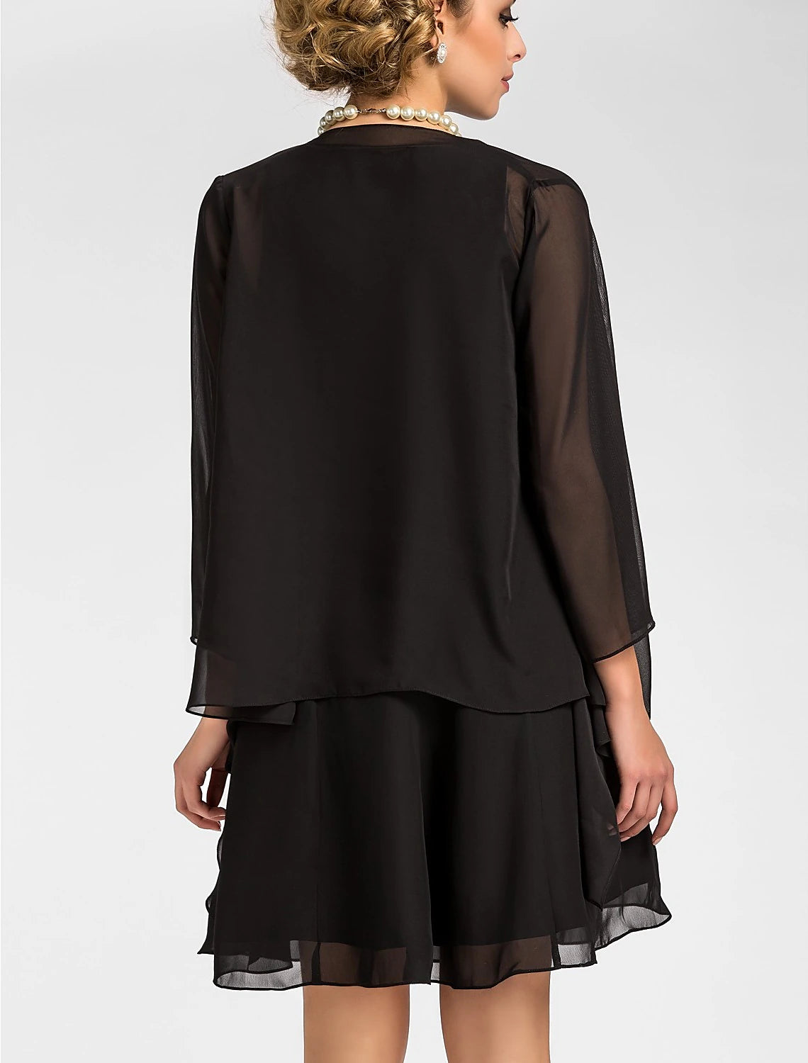 Full length view of the A-Line dress, highlighting the knee-length hem and flowing chiffon.