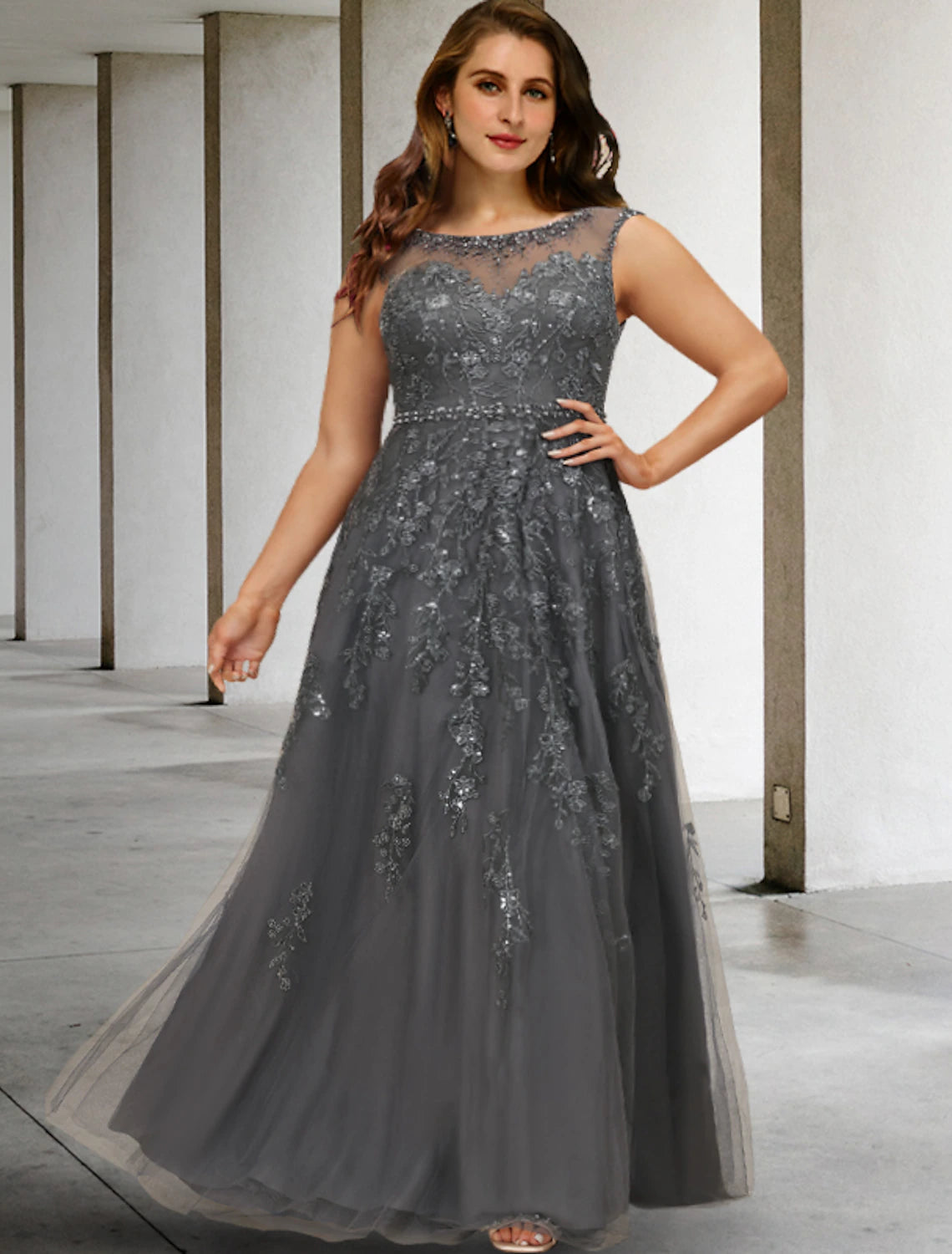 Elegant A-line plus size mother of the bride dress with jewel neck and lace details.