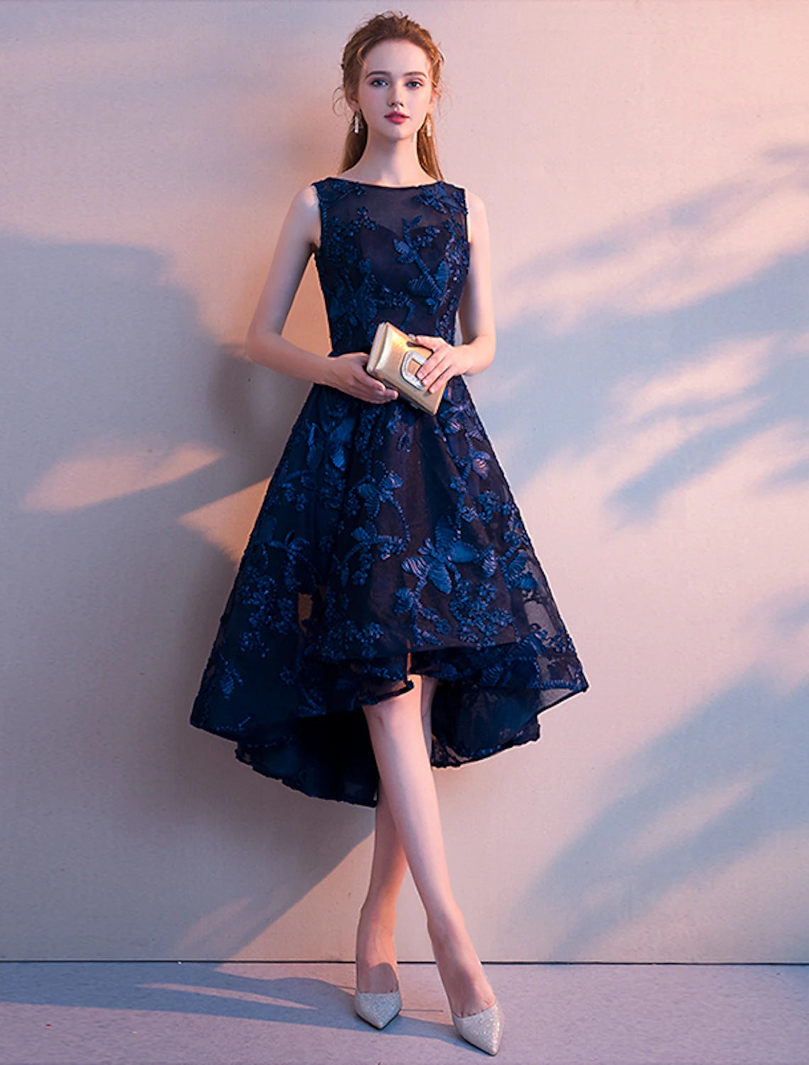 Elegant A-Line Jewel Neck Tulle Cocktail Dress with asymmetrical hem and pleats.