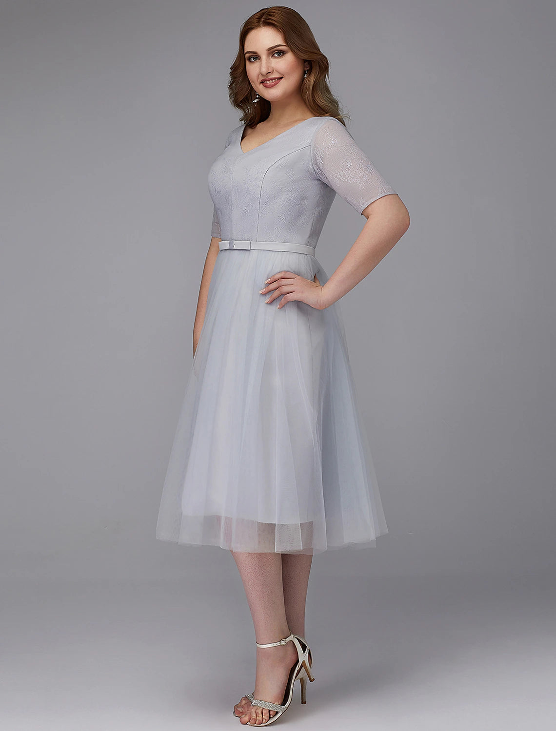 Elegant A-Line Lace V-Neck Short Sleeve Tea Length Cocktail Dress.