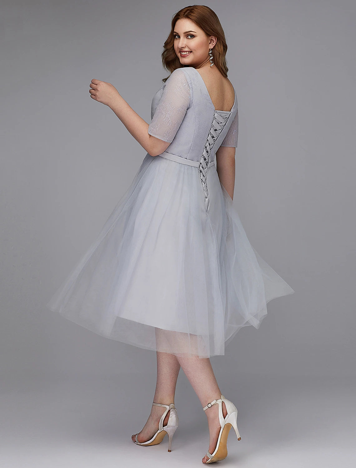 Elegant A-Line Lace V-Neck Short Sleeve Tea Length Cocktail Dress.