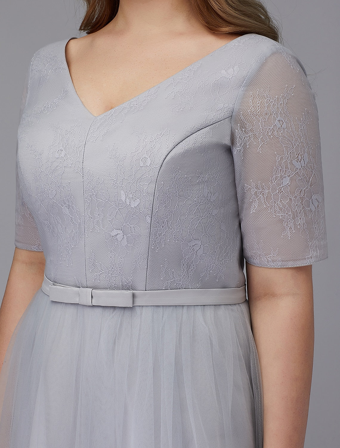 Elegant A-Line Lace V-Neck Short Sleeve Tea Length Cocktail Dress.
