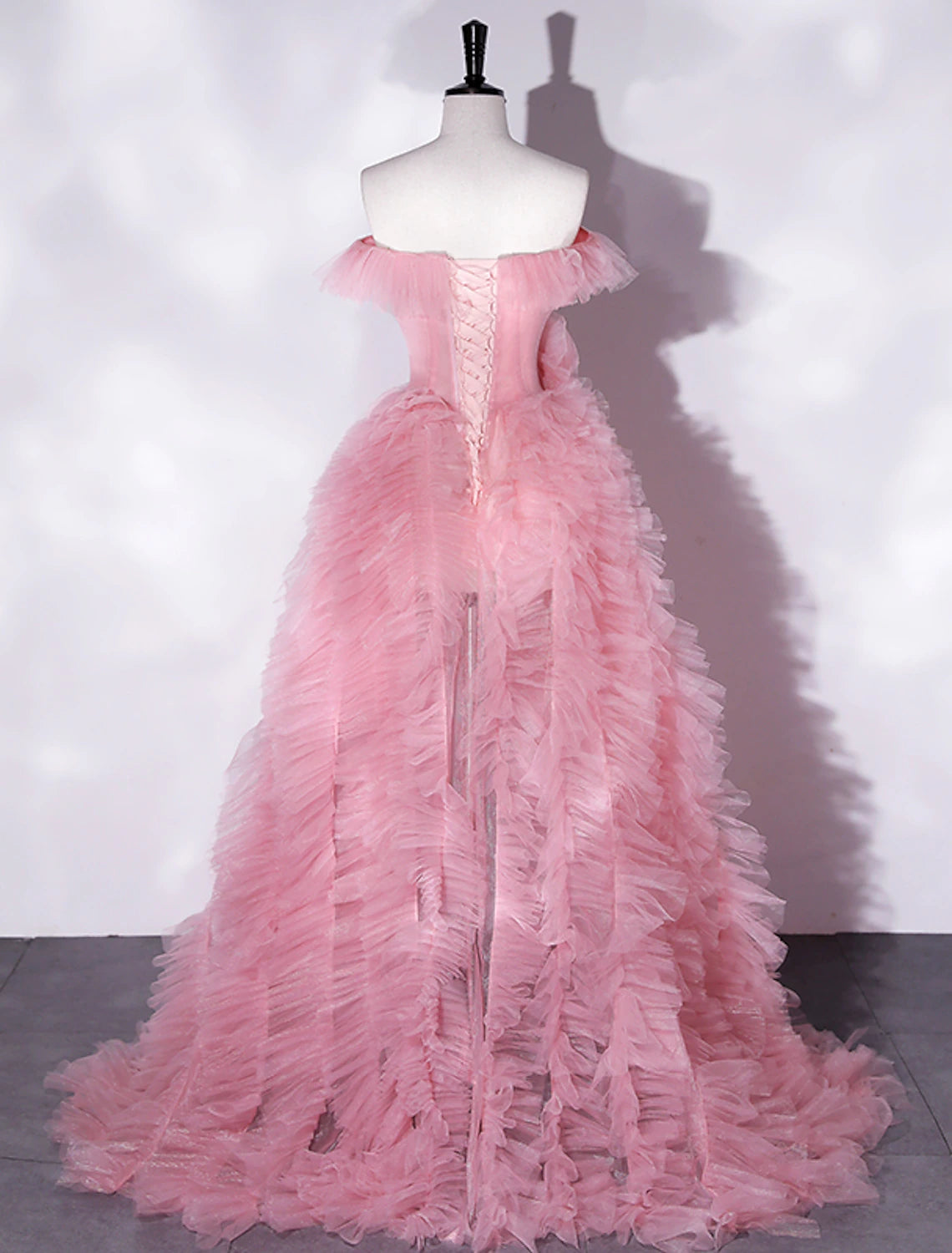 Side view of A-Line off-shoulder floral tulle prom dress with asymmetrical hem.