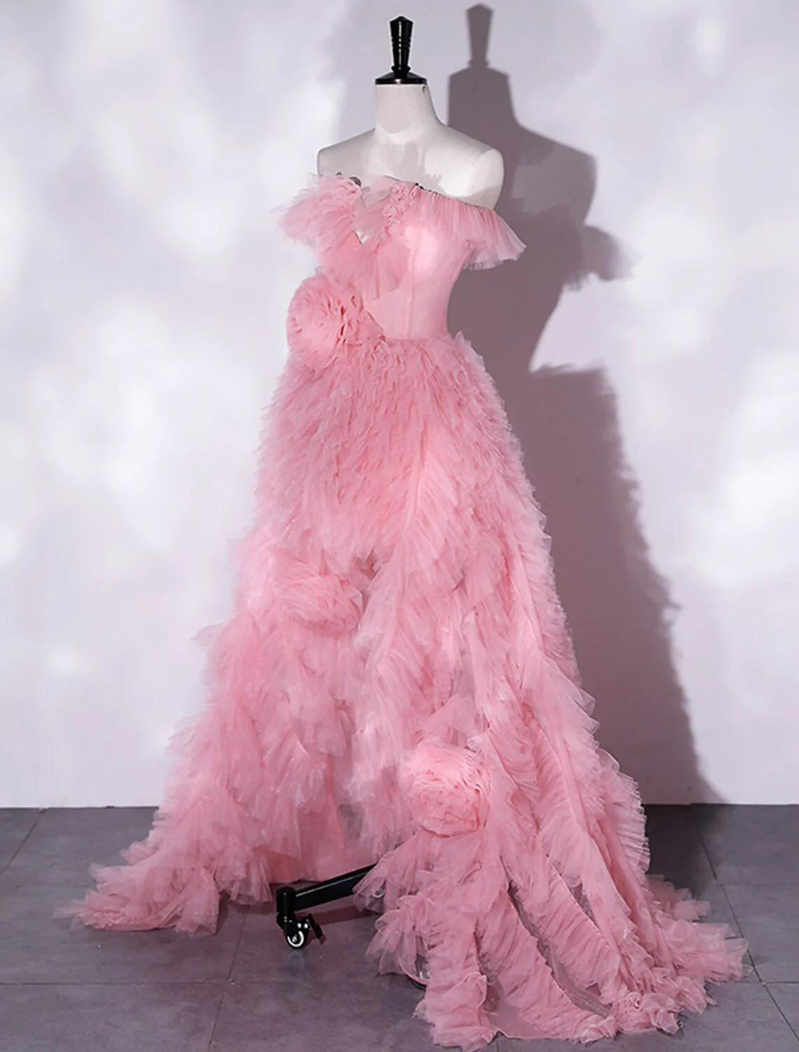 Back view of sleeveless off-shoulder floral tulle prom dress.