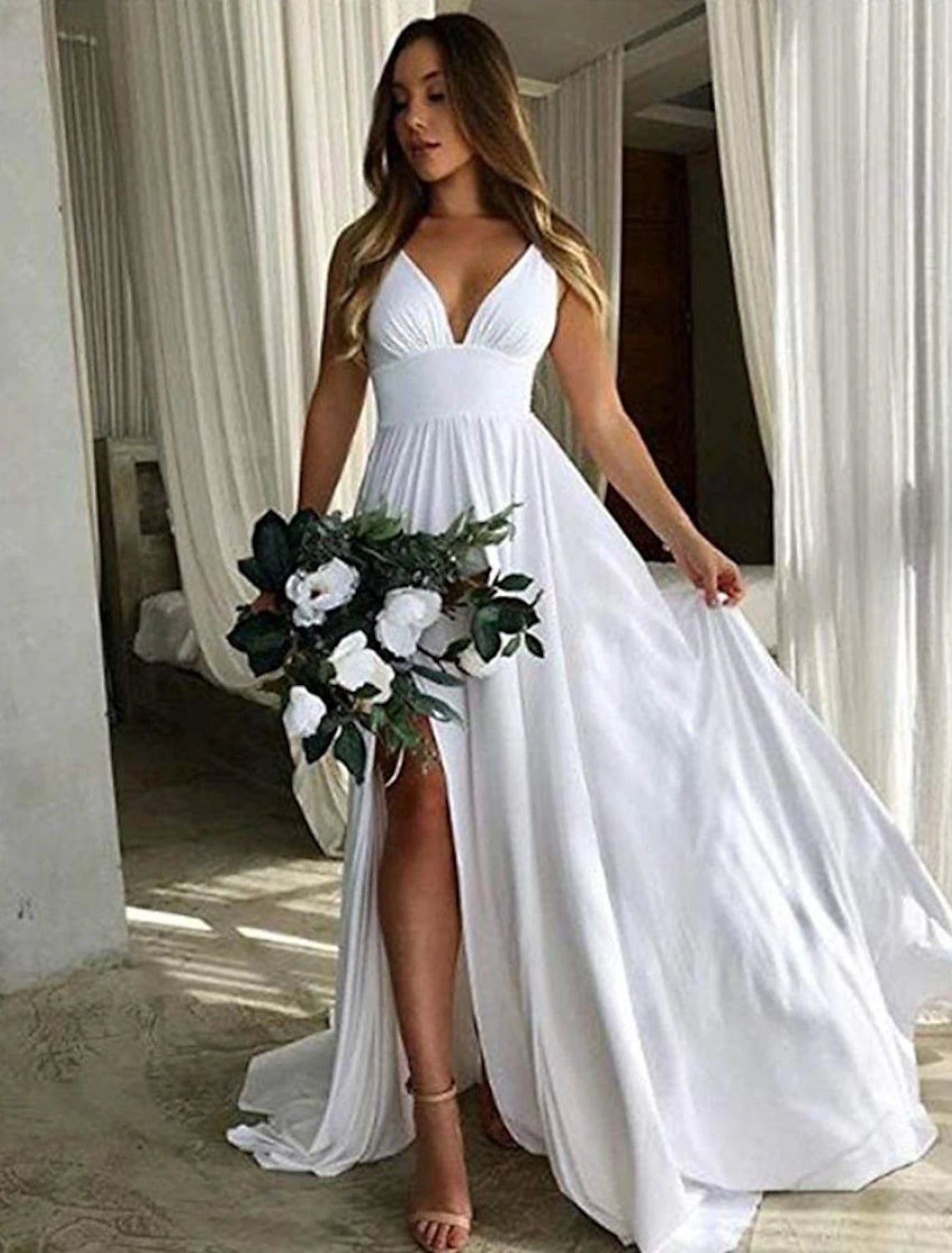 Elegant A-Line bridesmaid dress with plunging neckline and pleated chiffon.