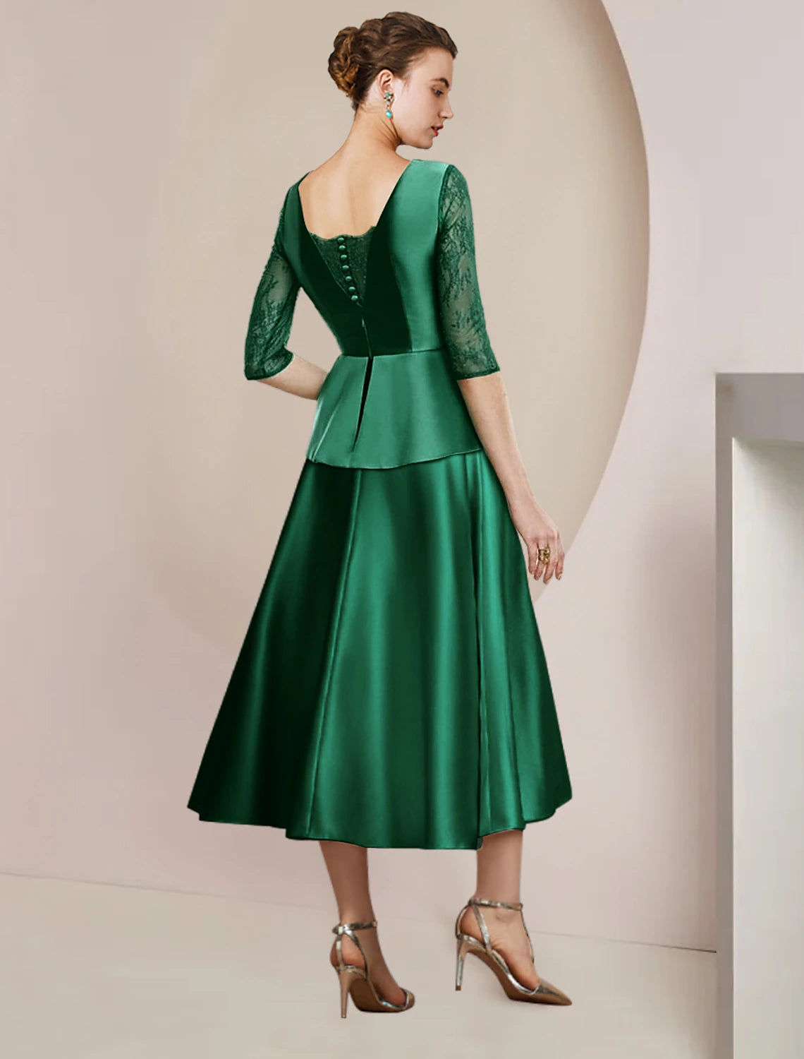 Full view of the elegant A-Line tea-length dress, perfect for wedding guests.
