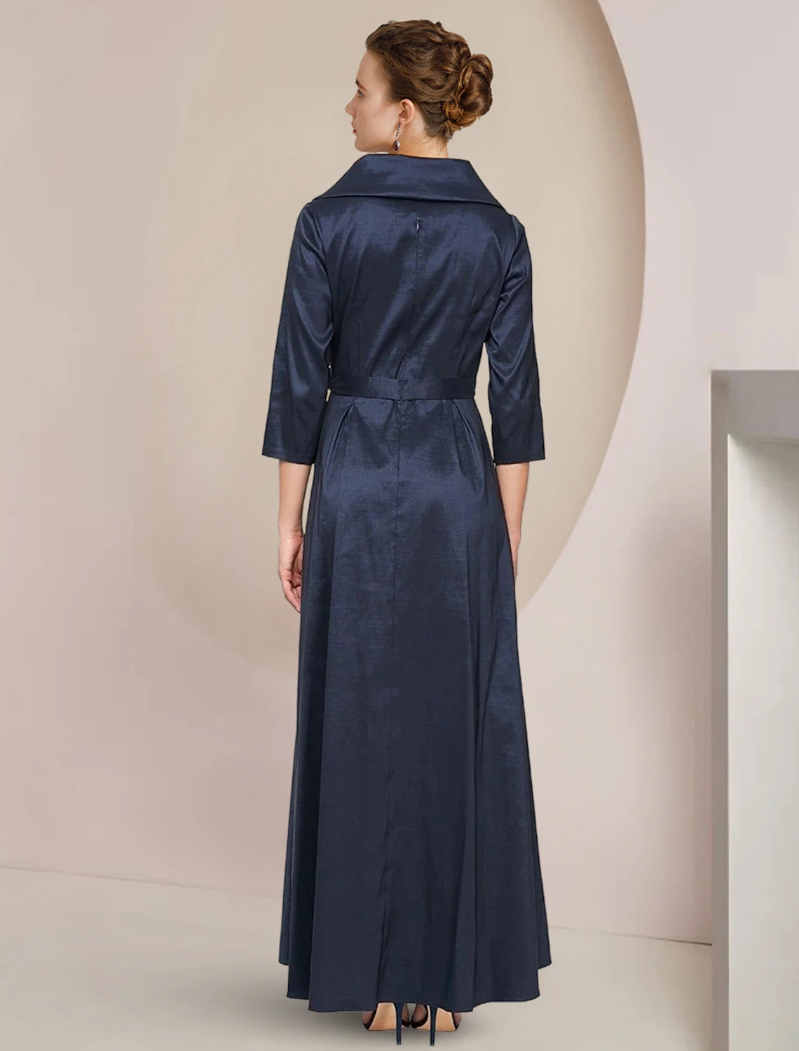 Formal A-Line dress featuring short sleeves and an elegant asymmetrical hem.