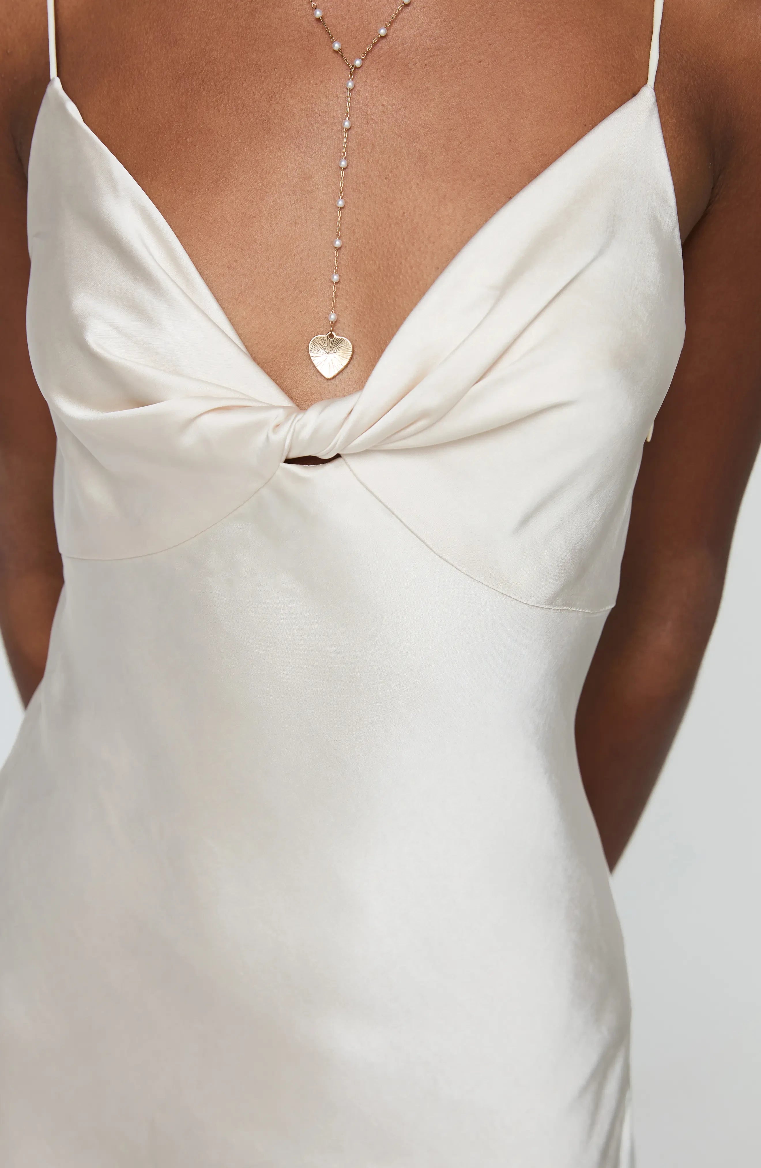 Elegant A-Line Twisted V-Neck Spaghetti Strap Silky Mini Homecoming Dress.