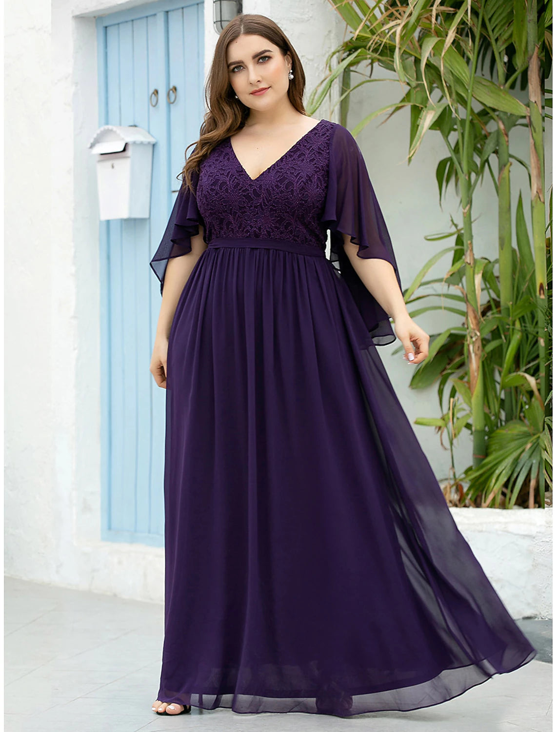 Flowing chiffon skirt detail of an elegant A-line plus size Mother of the Bride dress.