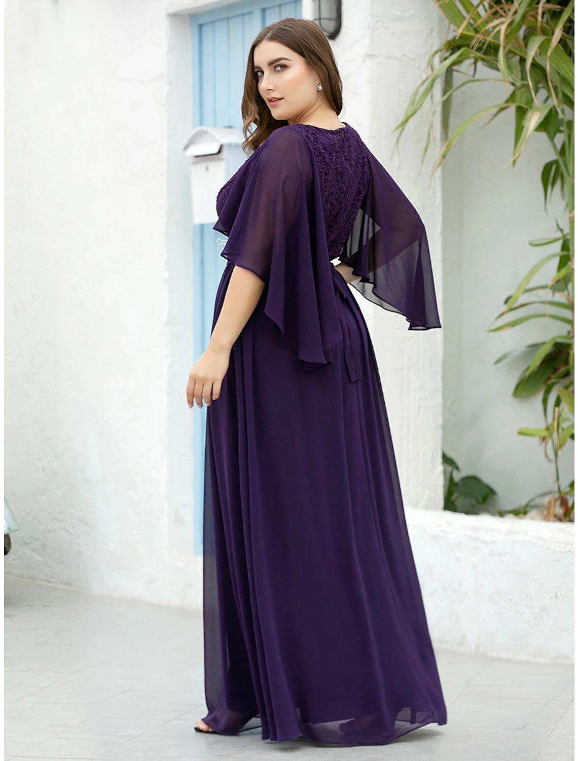 Full length view of an elegant A-line V-neck half sleeve chiffon plus size Mother of the Bride dress.