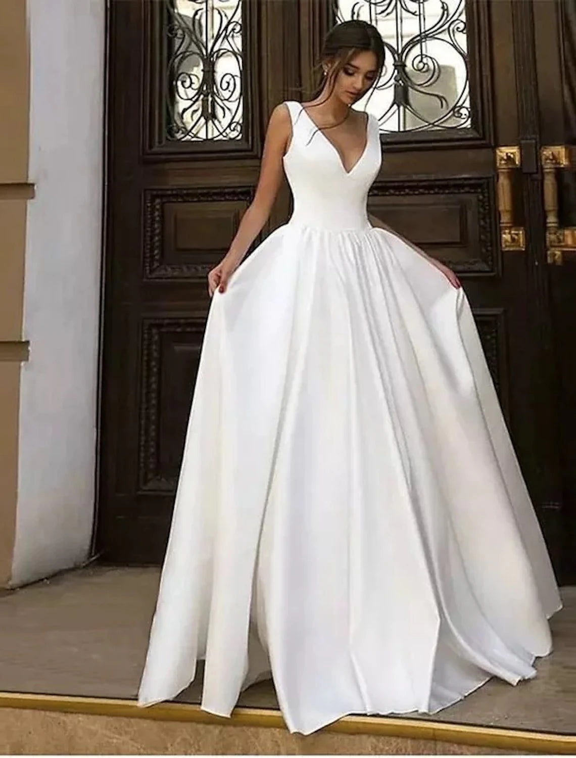 Elegant A-Line V-Neck Pleated Satin Floor-Length Bridal Gown in Solid Color.