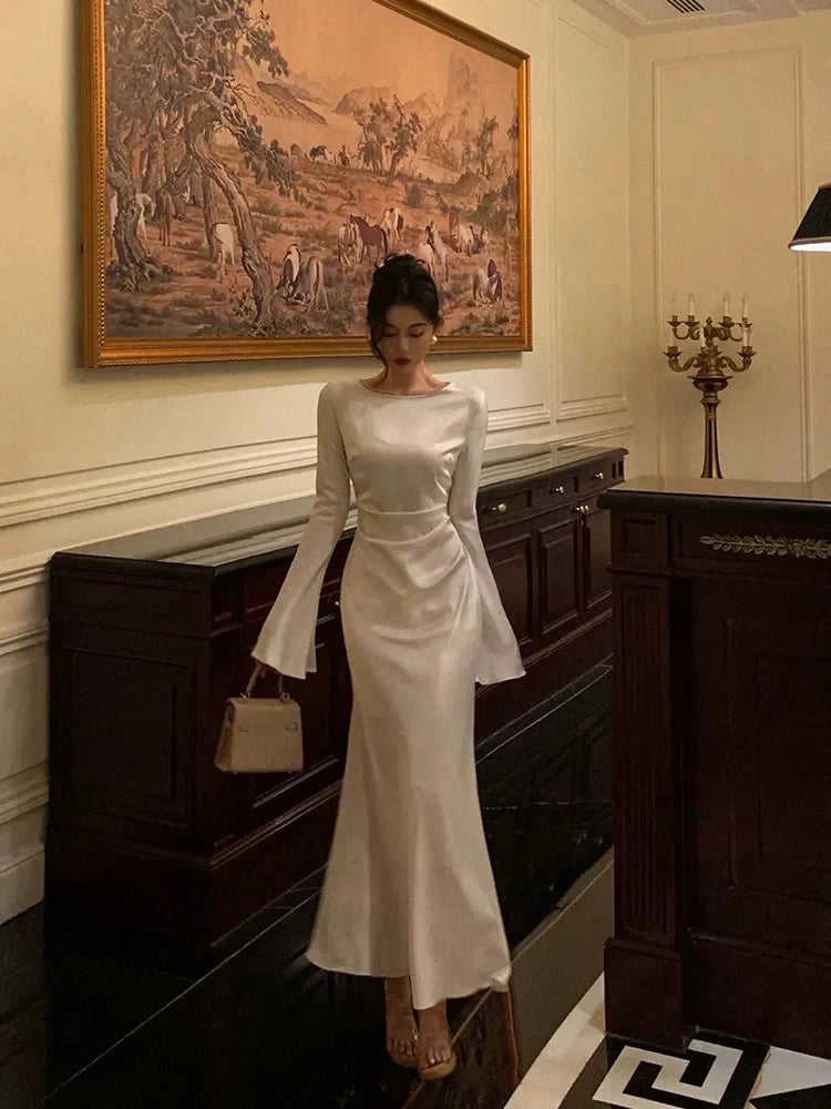 Elegant Mermaid Boat Neck Long-Sleeve Open Back Ruched Satin Evening Dress