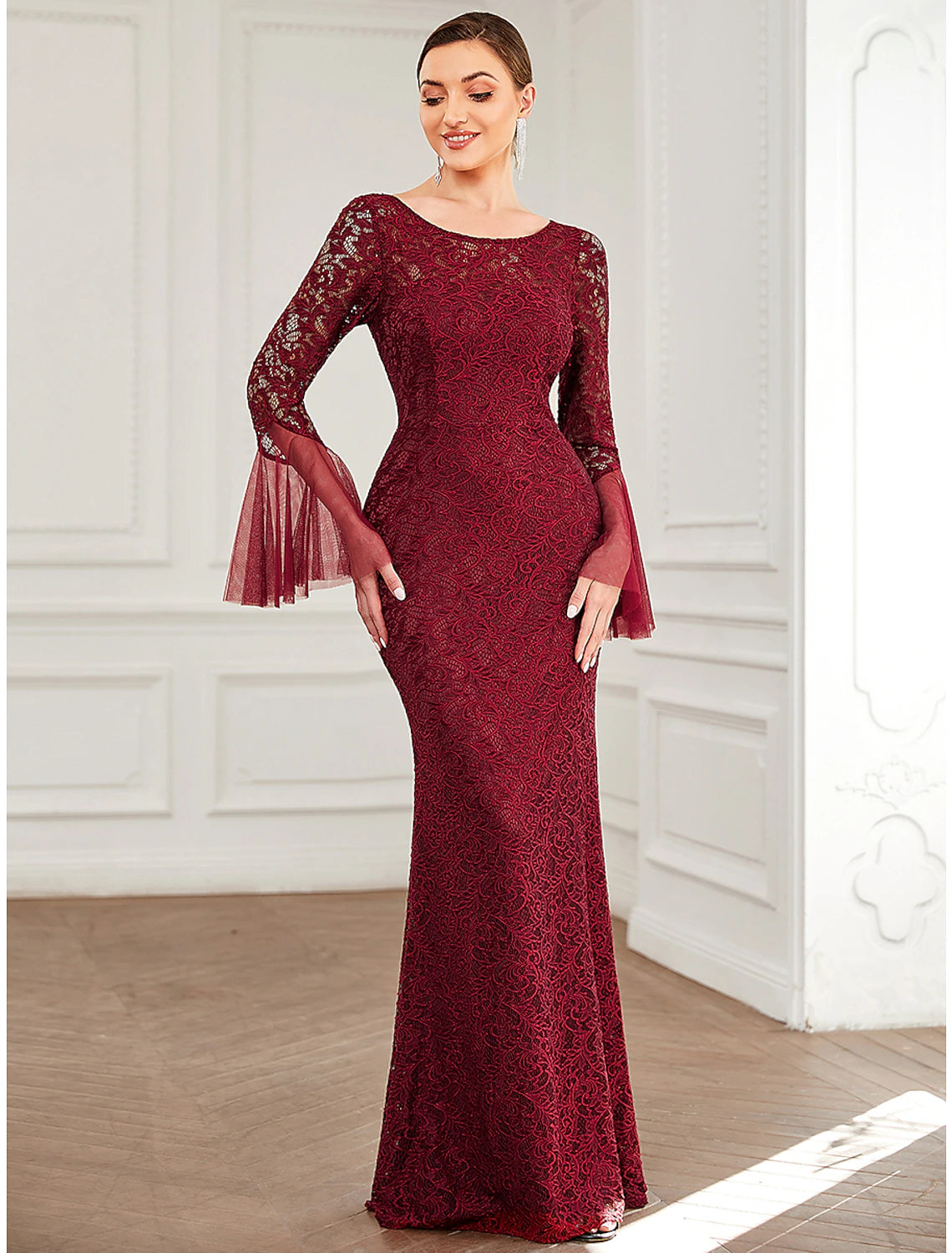 Full length view of the sophisticated mother of the bride dress.