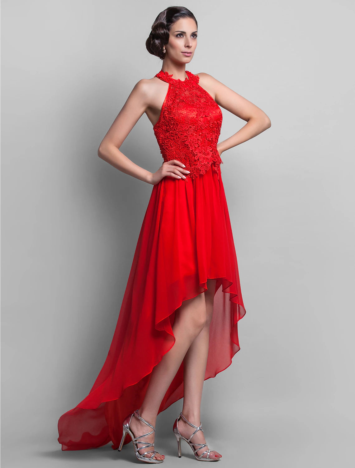 Back view of the elegant open back dress with appliques.