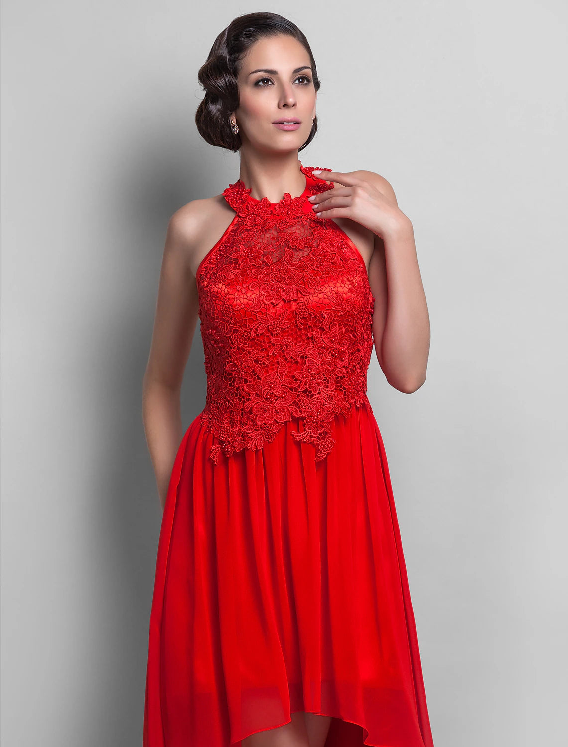 Side profile of the asymmetrical sheath dress.