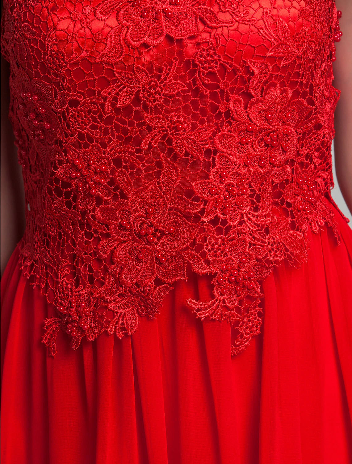 Detailed texture of the chiffon fabric and appliques.