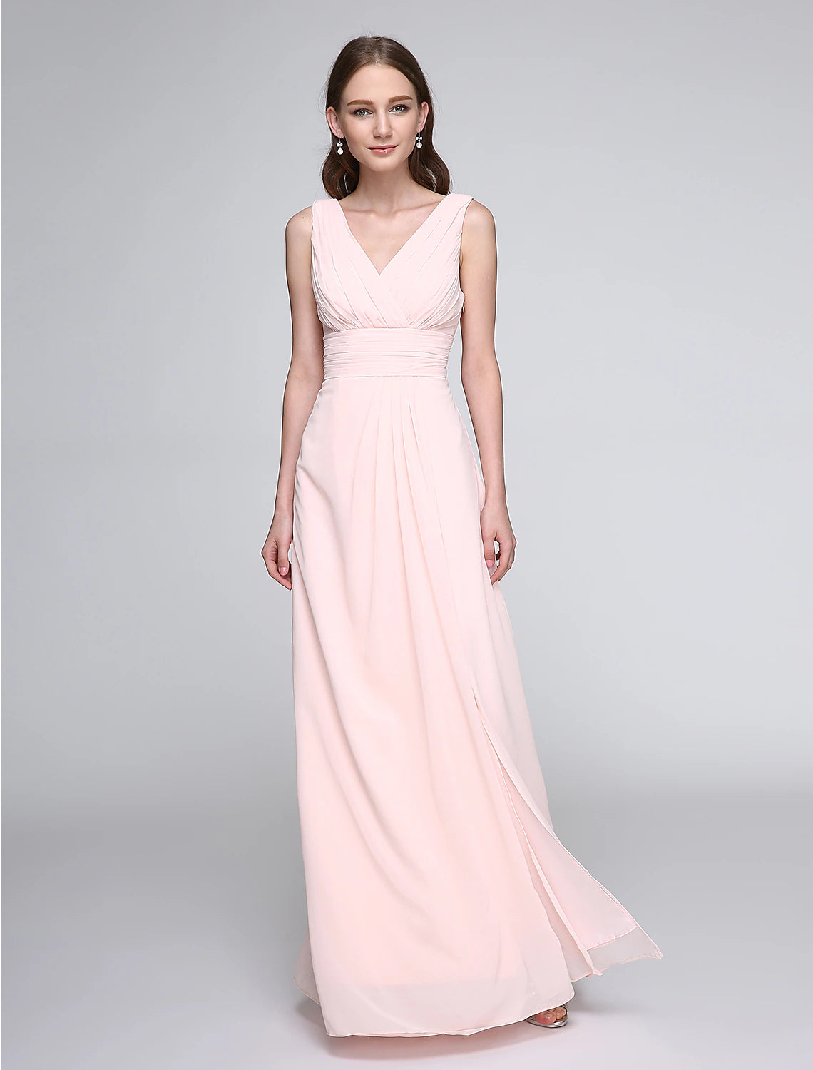 Model in an elegant V-neck sheath chiffon bridesmaid dress with criss-cross ruched details.