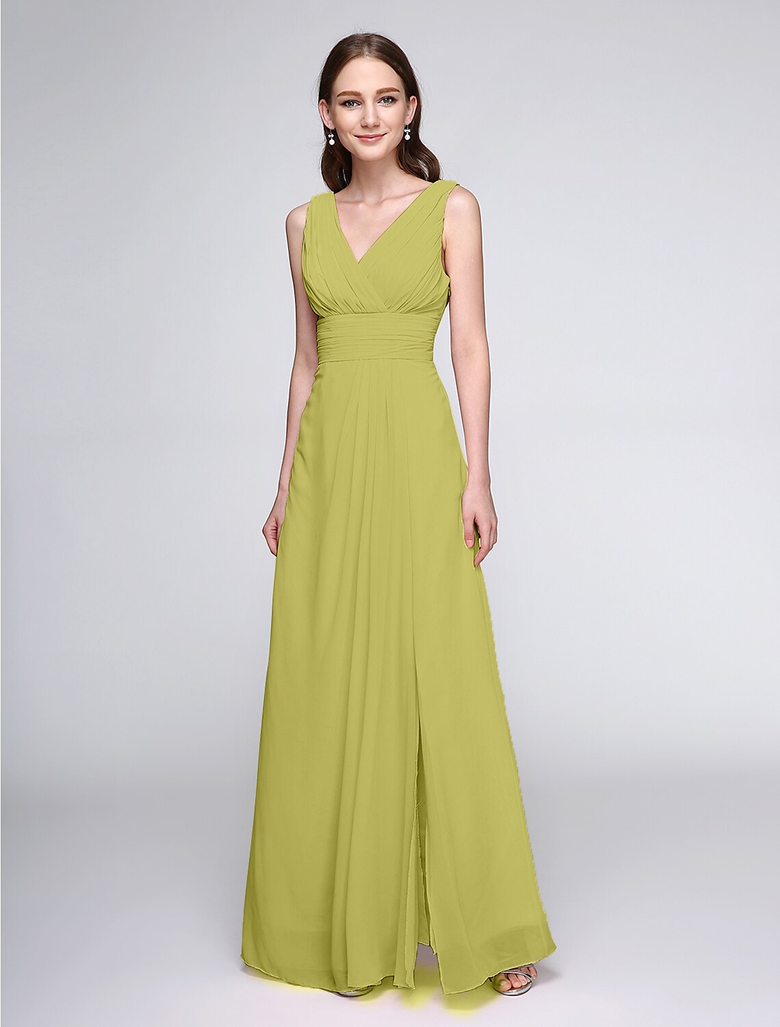 Model posing in a graceful V-neck sheath bridesmaid dress with ruched chiffon.