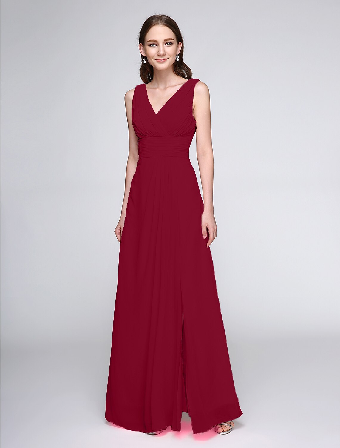 Close-up of the V-neck and ruched details on a chiffon bridesmaid dress.
