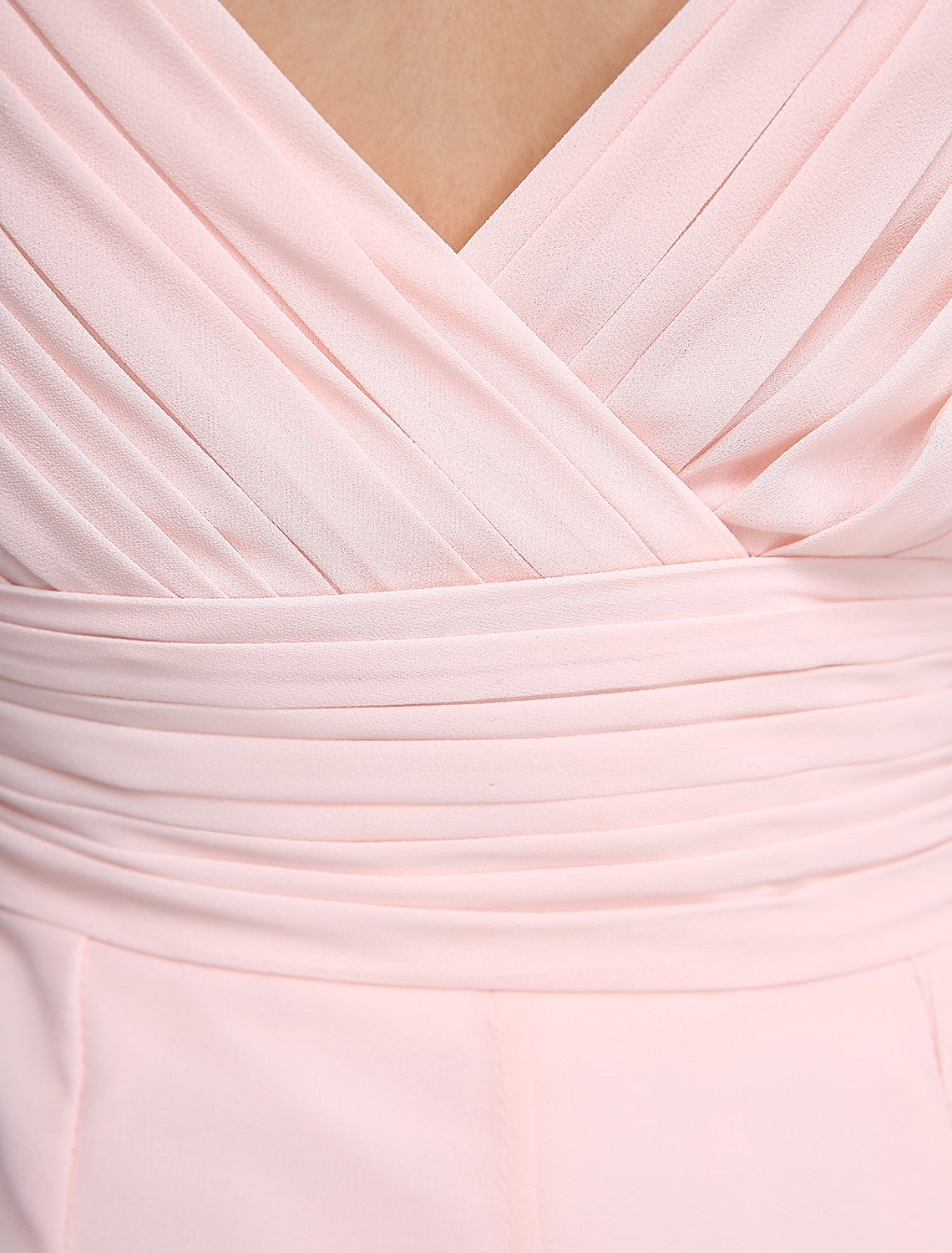 Detailed view of the criss-cross back and ruched texture of the chiffon bridesmaid dress.