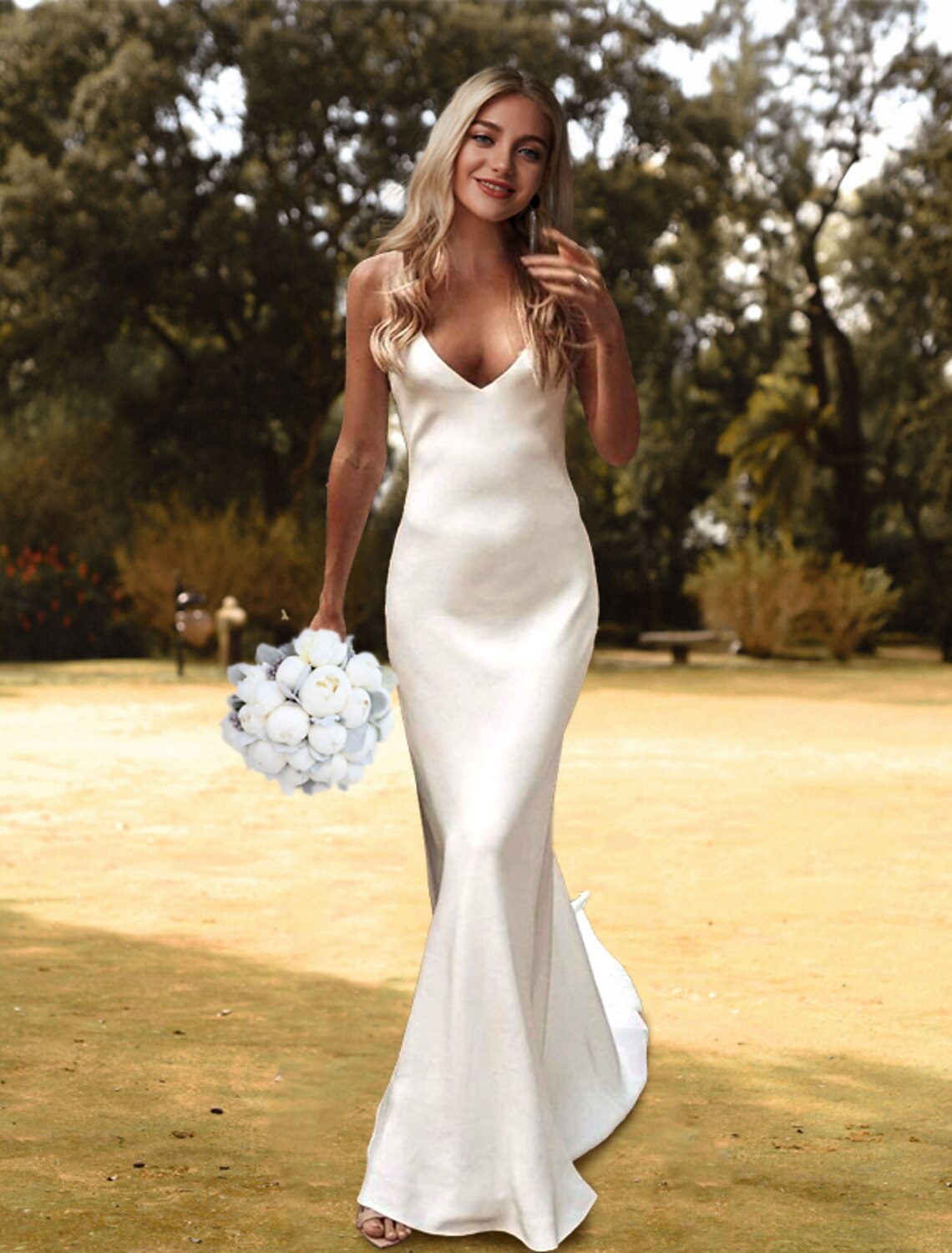 Elegant white sheath wedding gown with V-neck and spaghetti straps, featuring a court train.