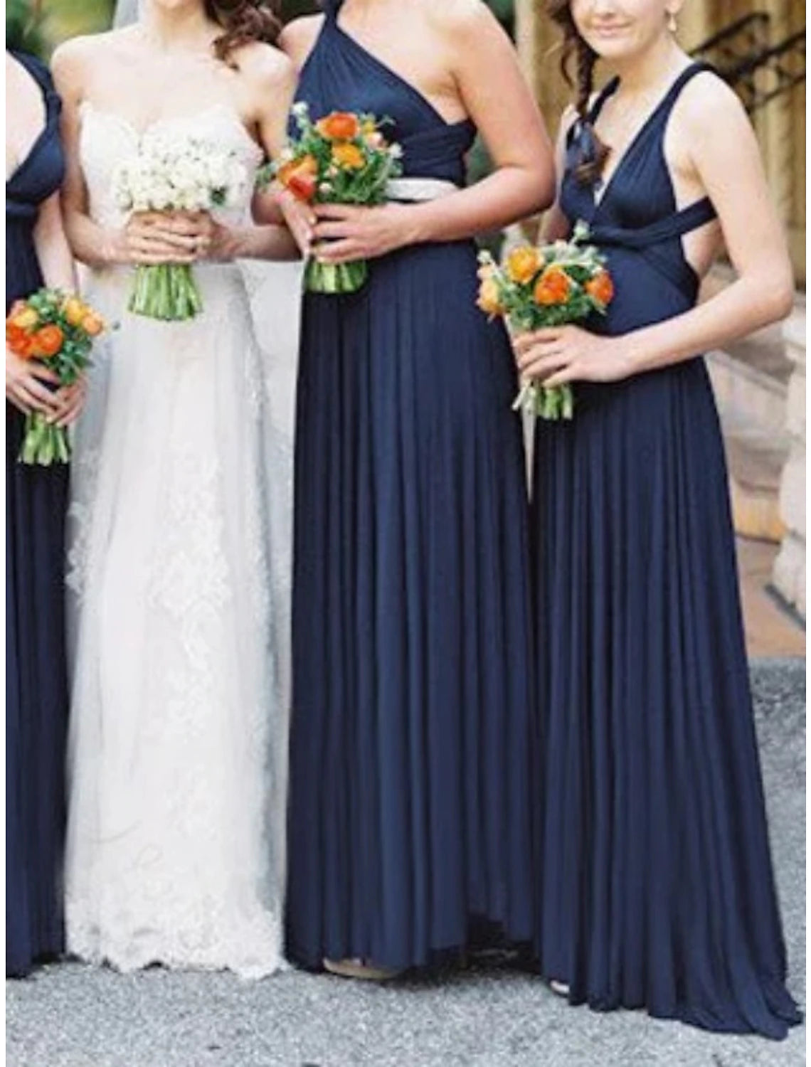 Back view of a blue convertible sheath bridesmaid dress with pleats.