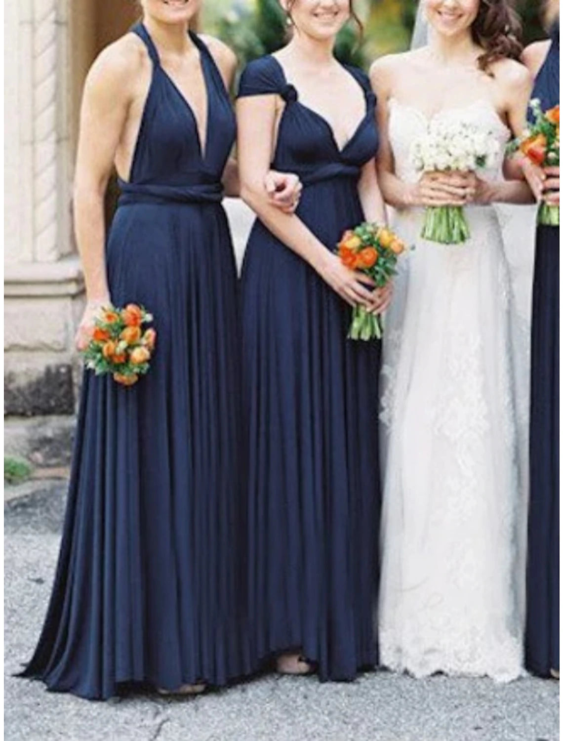 Side view of a blue floor-length spandex bridesmaid dress.