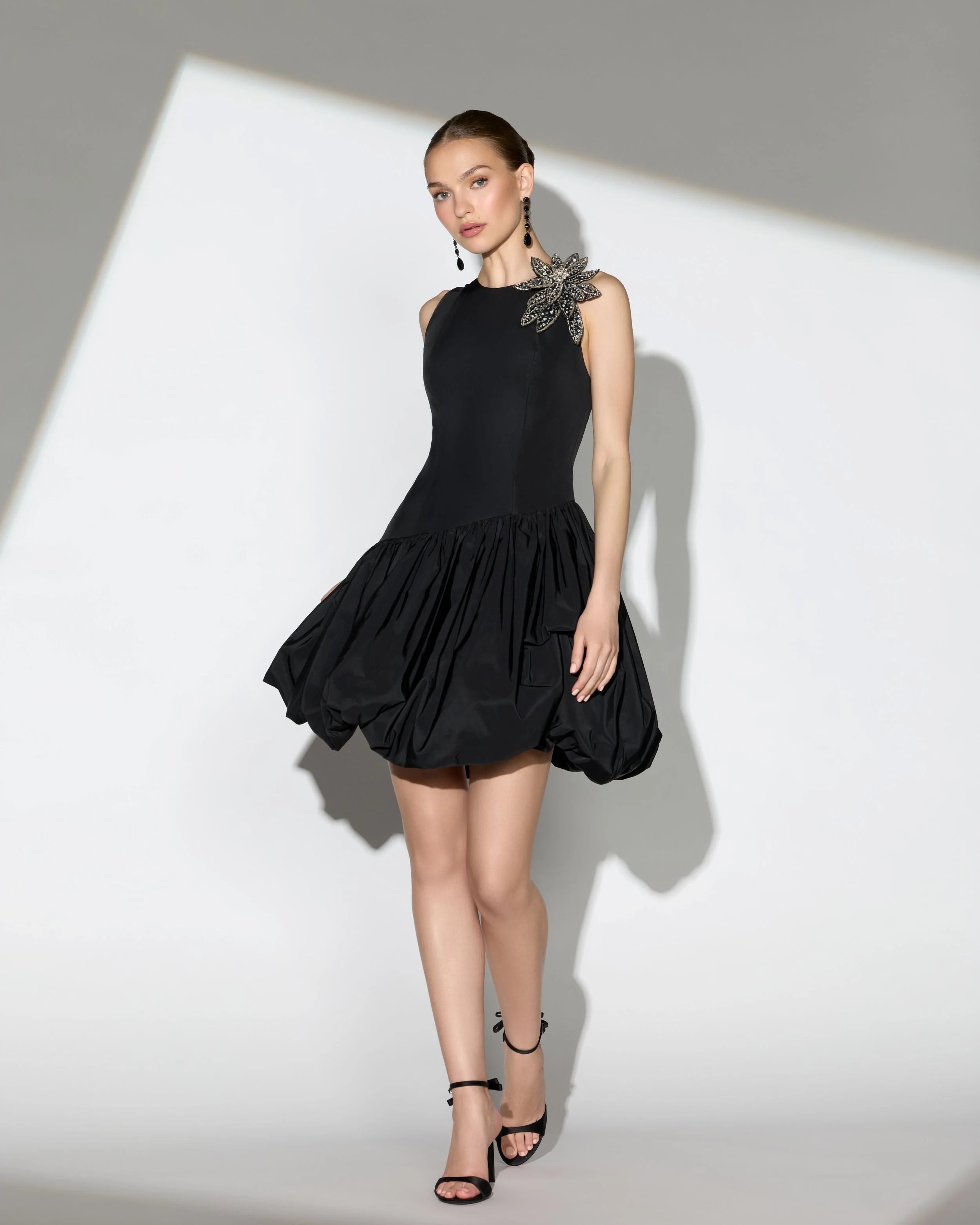 Elegant A-Line High Neck Sleeveless Embellished Black Mini Homecoming Dress