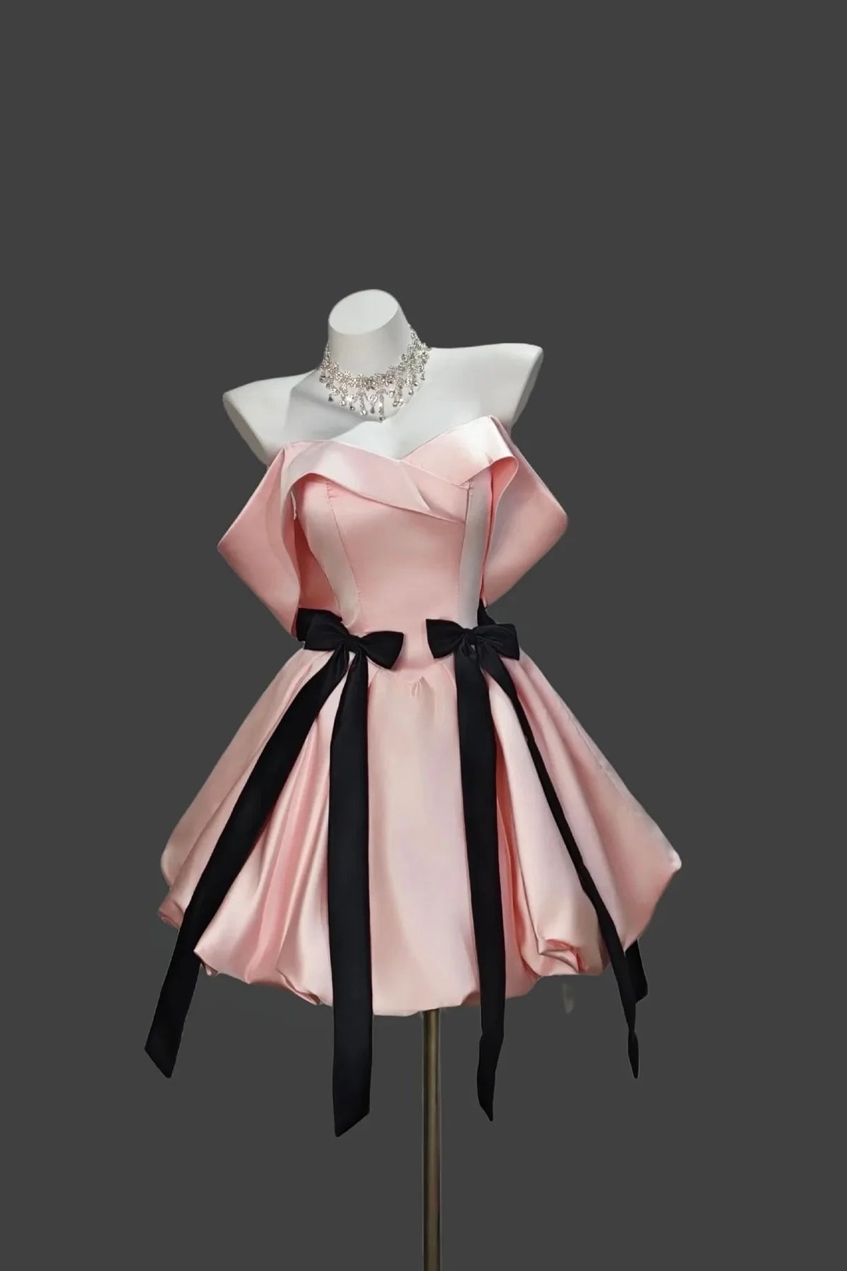 Elegant A-Line Off-Shoulder Draped Sleeveless Short Homecoming Dress with Playful Black Bows