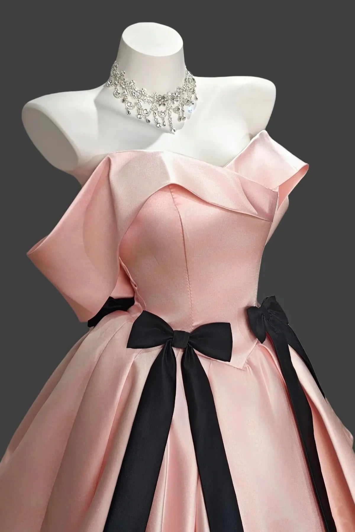 Elegant A-Line Off-Shoulder Draped Sleeveless Short Homecoming Dress with Playful Black Bows