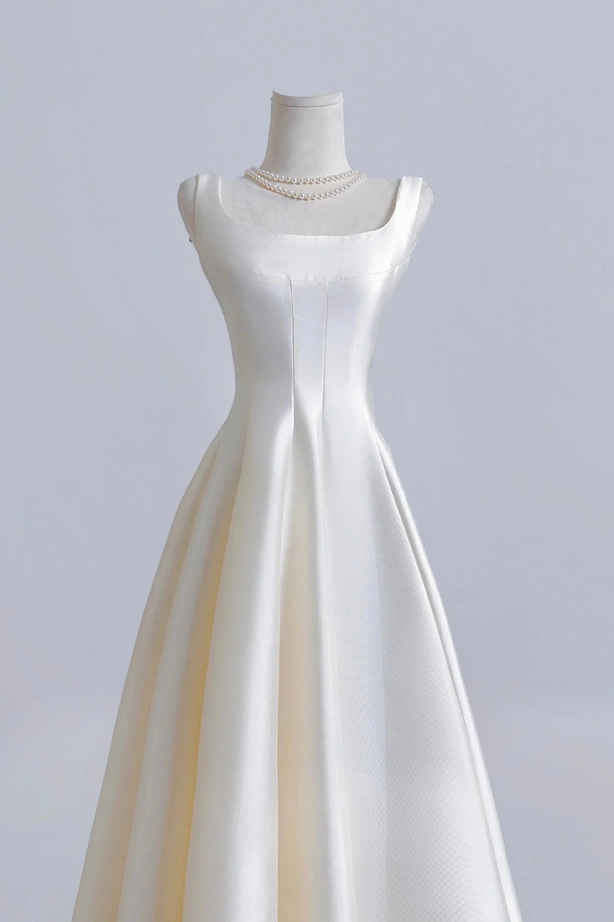 Elegant A-Line Square Neck Sleeveless Scoop Back Tea-Length Ivory Satin Homecoming Dresses