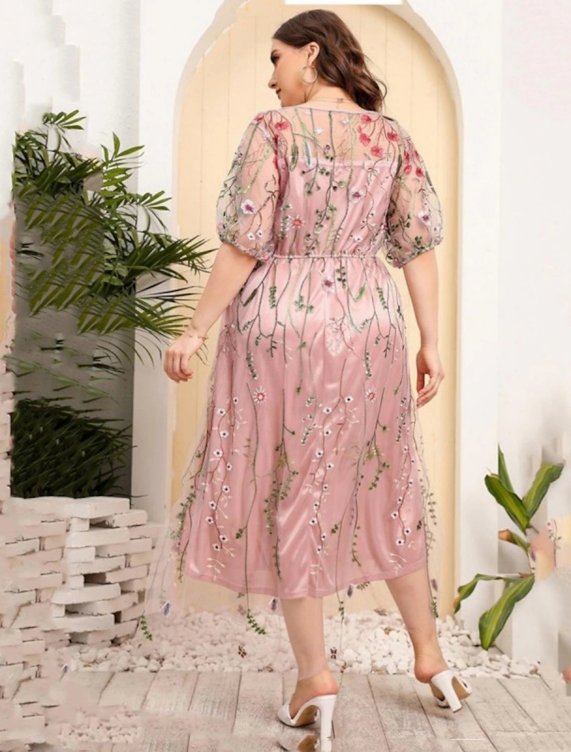 Back view of the elegant plus size ankle-length mother of the bride gown.