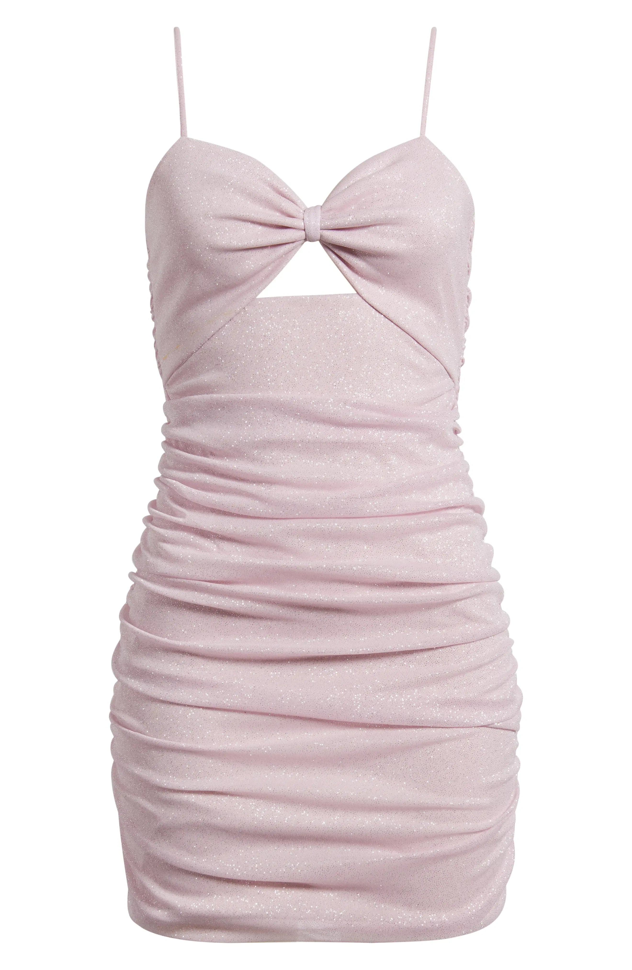 Back view of a shimmering pink bodycon mini dress, showing ruched detail and spaghetti straps.