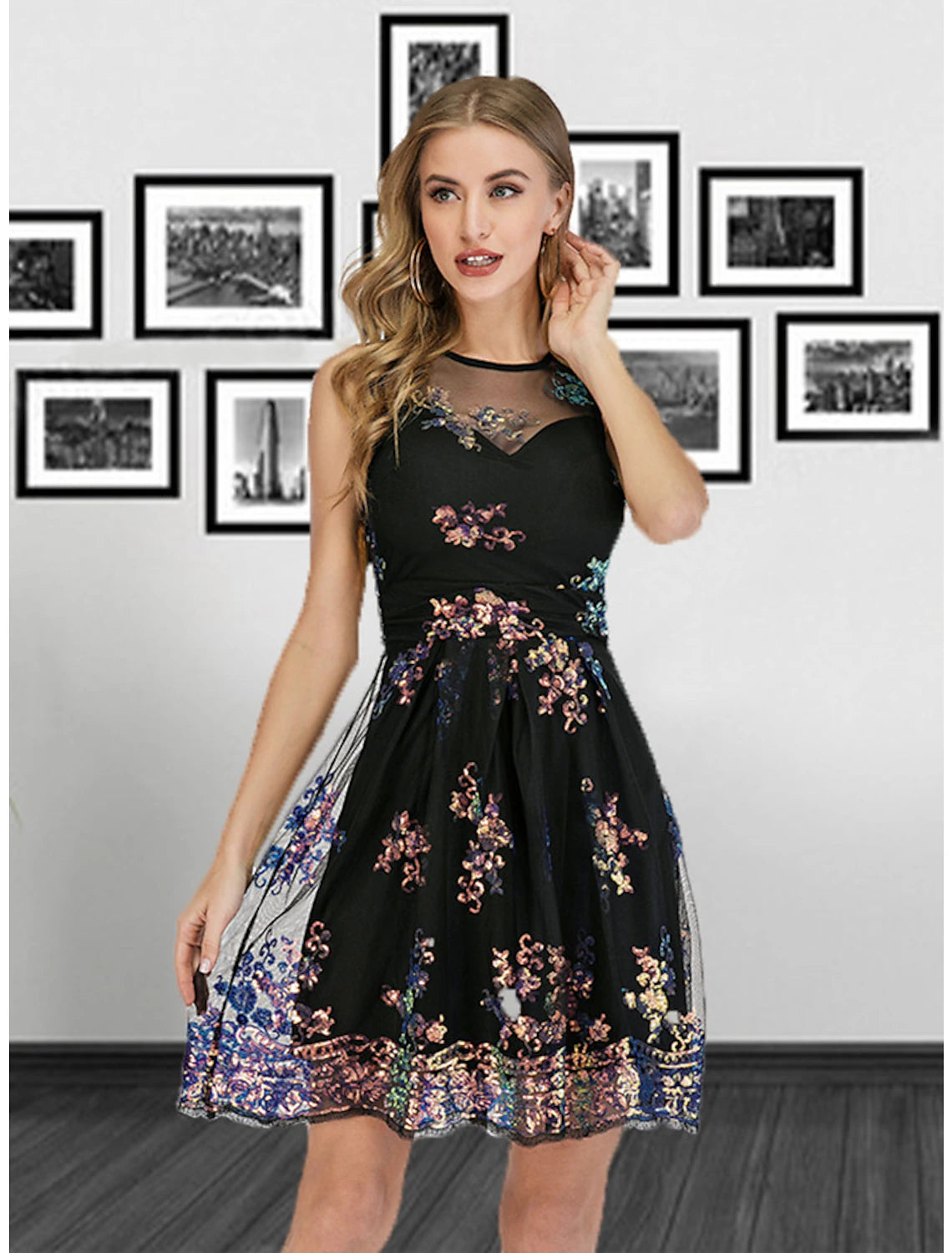 Model wearing a sparkling A-Line illusion neck pleated sequin short mini cocktail dress.