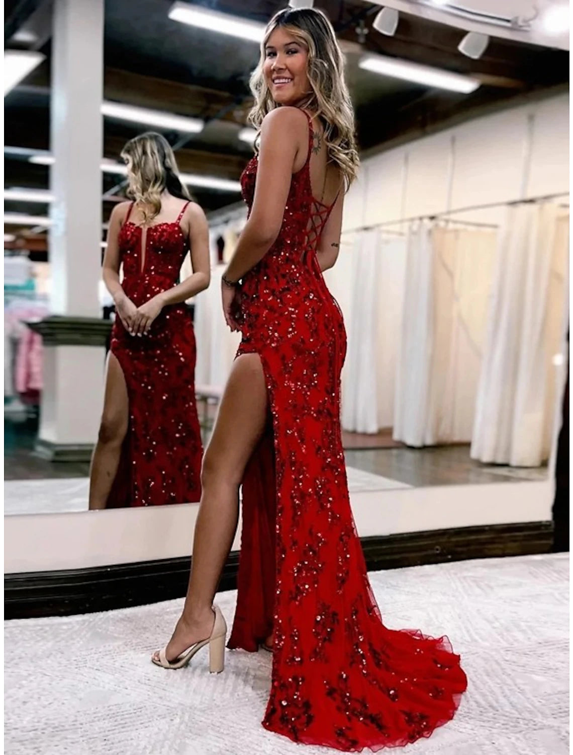 Stunning Mermaid V-Neck Open Back Prom Gown with Slit Appliques.