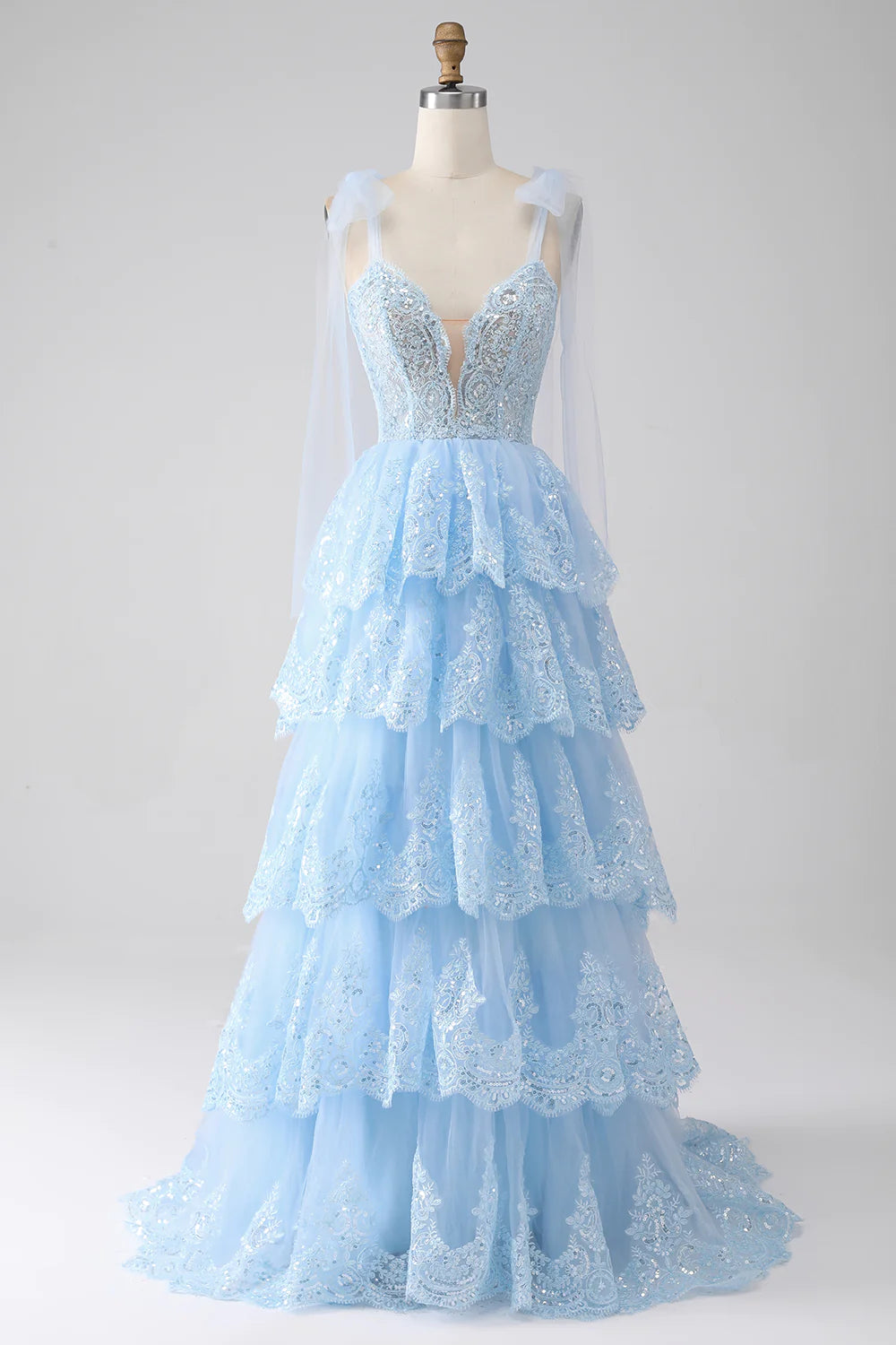 Wholesa Light Blue Sweetheart Bow Tie Straps Tiered Tulle Sequin Prom Dress with Appliques