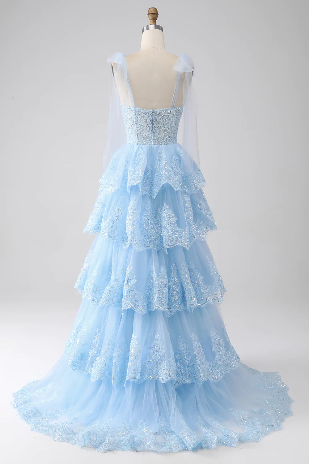 Wholesa Light Blue Sweetheart Bow Tie Straps Tiered Tulle Sequin Prom Dress with Appliques