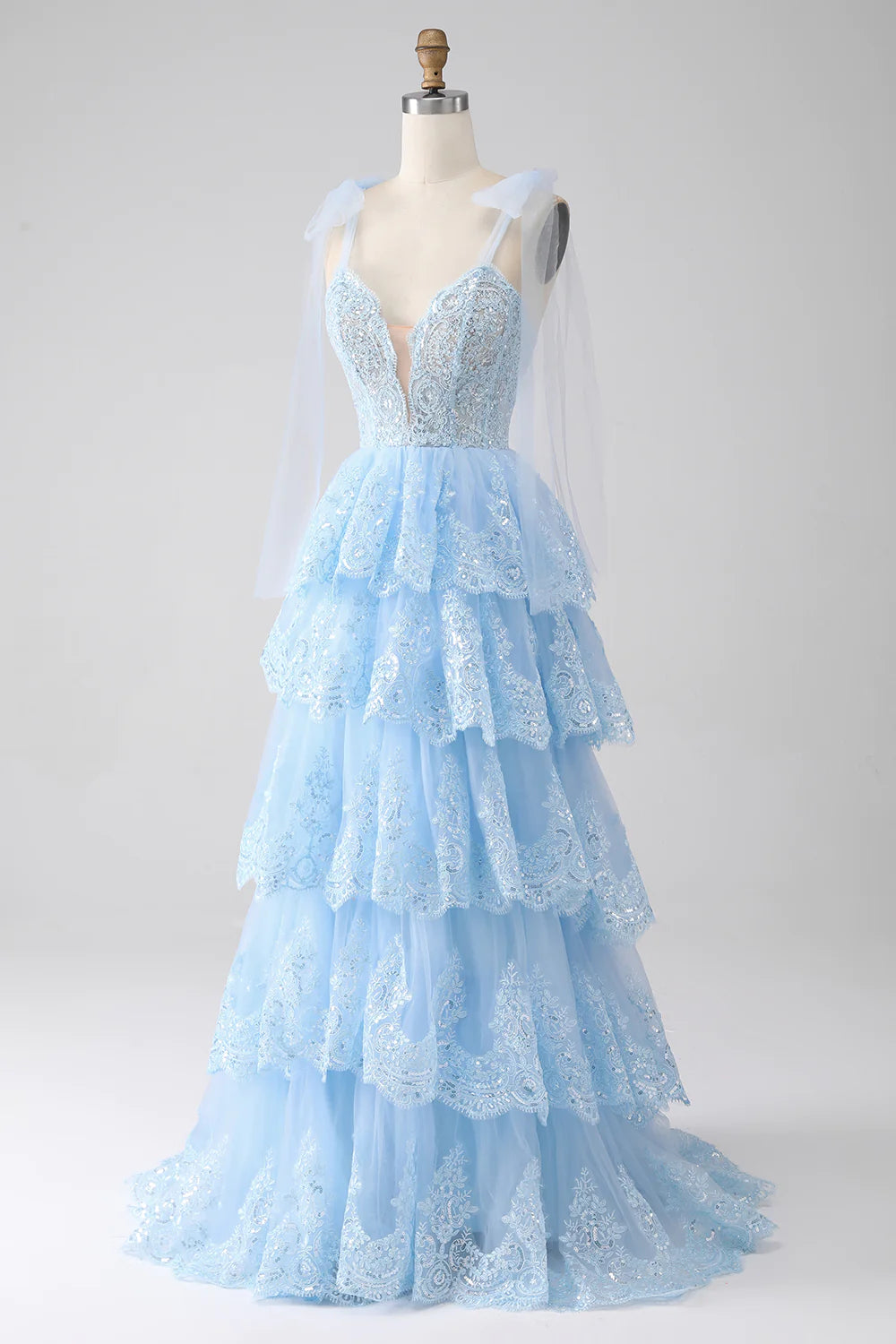 Wholesa Light Blue Sweetheart Bow Tie Straps Tiered Tulle Sequin Prom Dress with Appliques