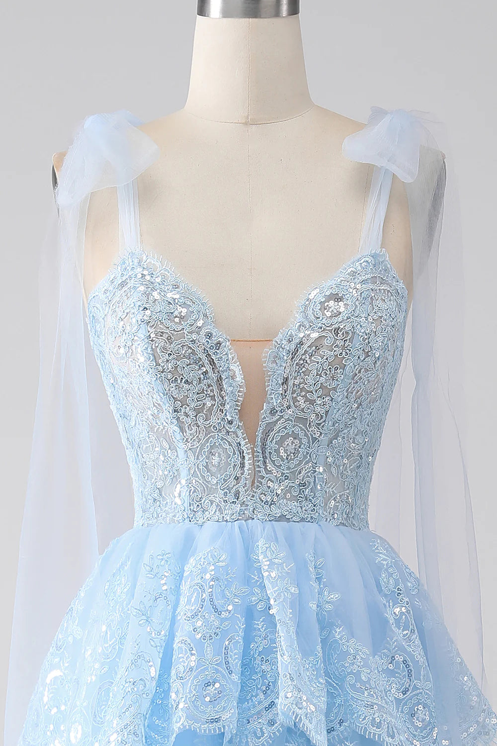 Wholesa Light Blue Sweetheart Bow Tie Straps Tiered Tulle Sequin Prom Dress with Appliques