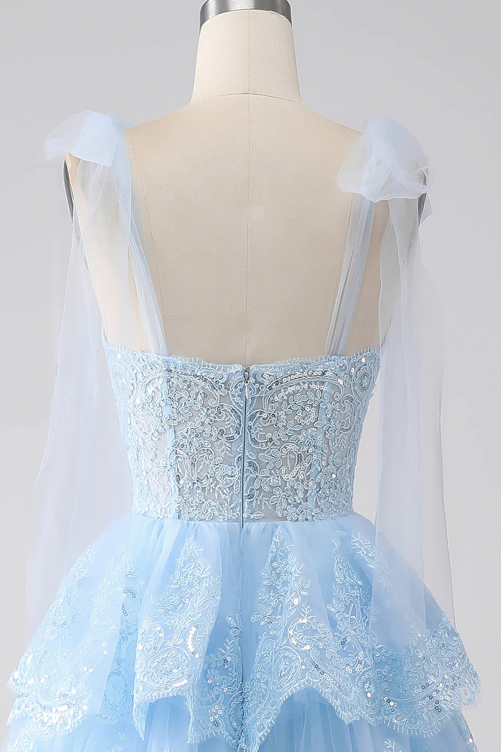 Wholesa Light Blue Sweetheart Bow Tie Straps Tiered Tulle Sequin Prom Dress with Appliques